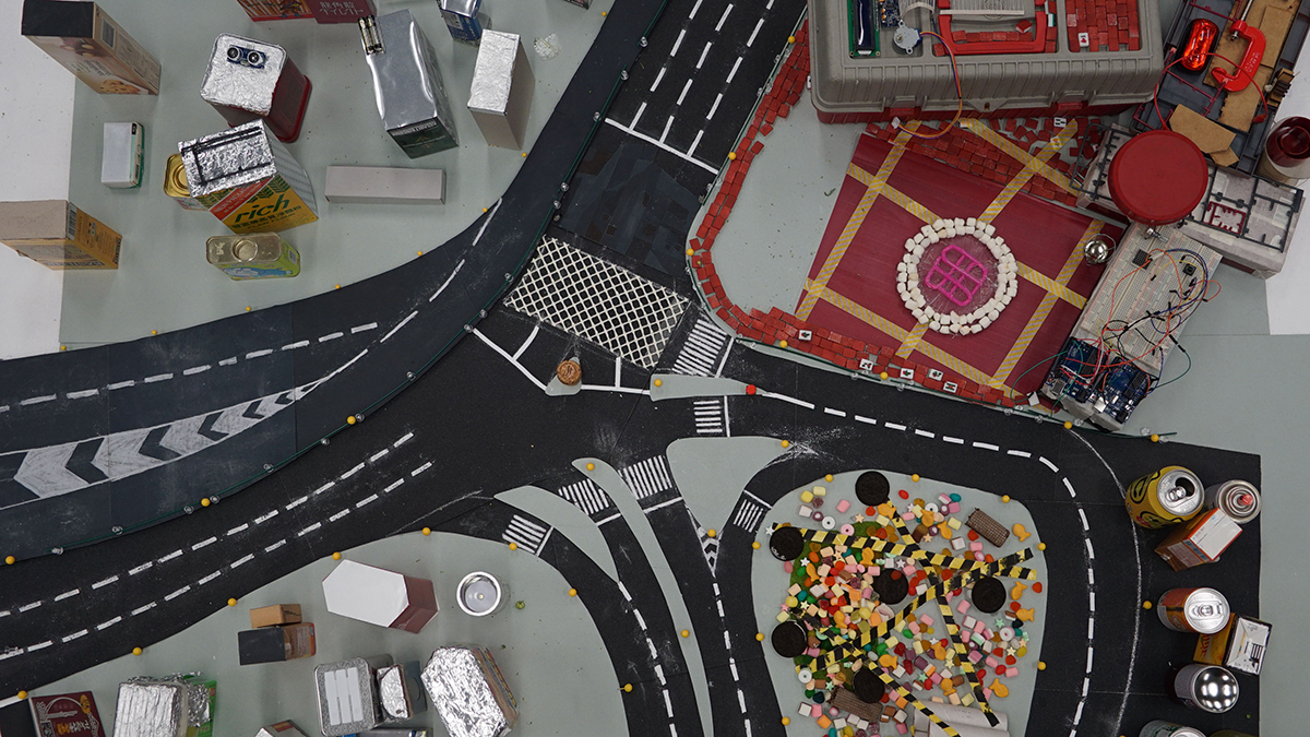 Aerial campus scene — before, created using physical items and Adobe Photoshop